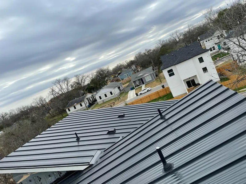Standing seam metal roof panels with vents for Skylight Repair in Westport